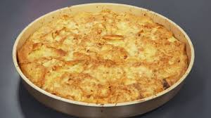 Pie with baked dumplings with milk